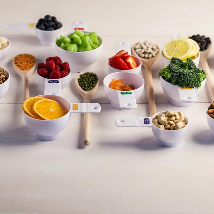 Bowls of fruit, vegetables and other foods
