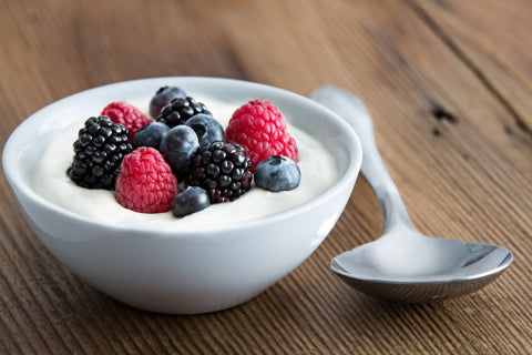Bowl of yoghurt with mixed berries