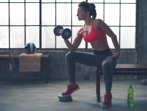 Woman doing a dumbbell squat