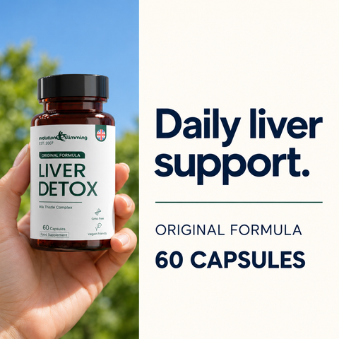 Hand holding a Liver Detox bottle outdoors, original formula, 60 capsules